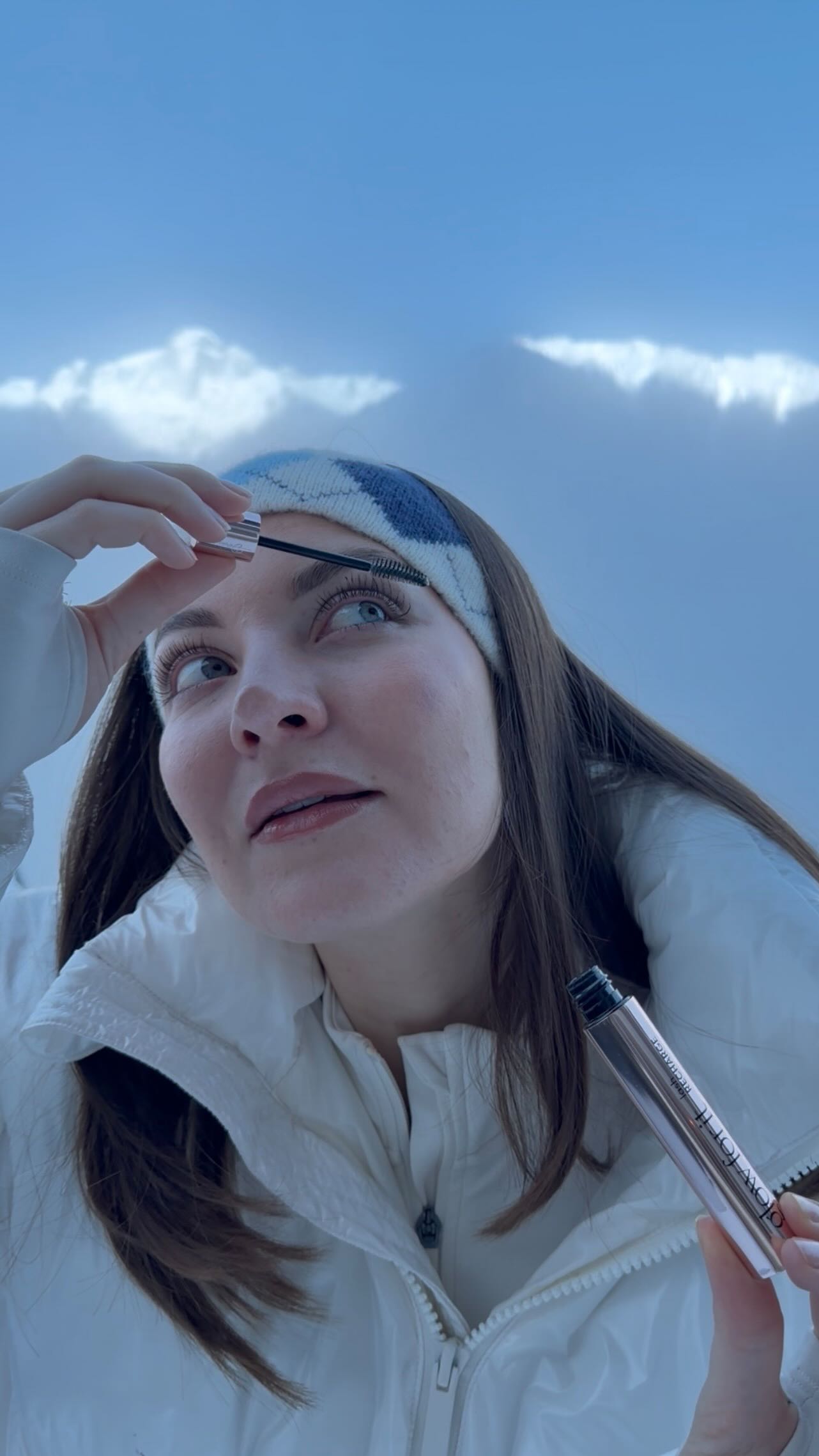 Instagram post with the caption: When your mascara even matches your fit on the slopes🤎⛷️...